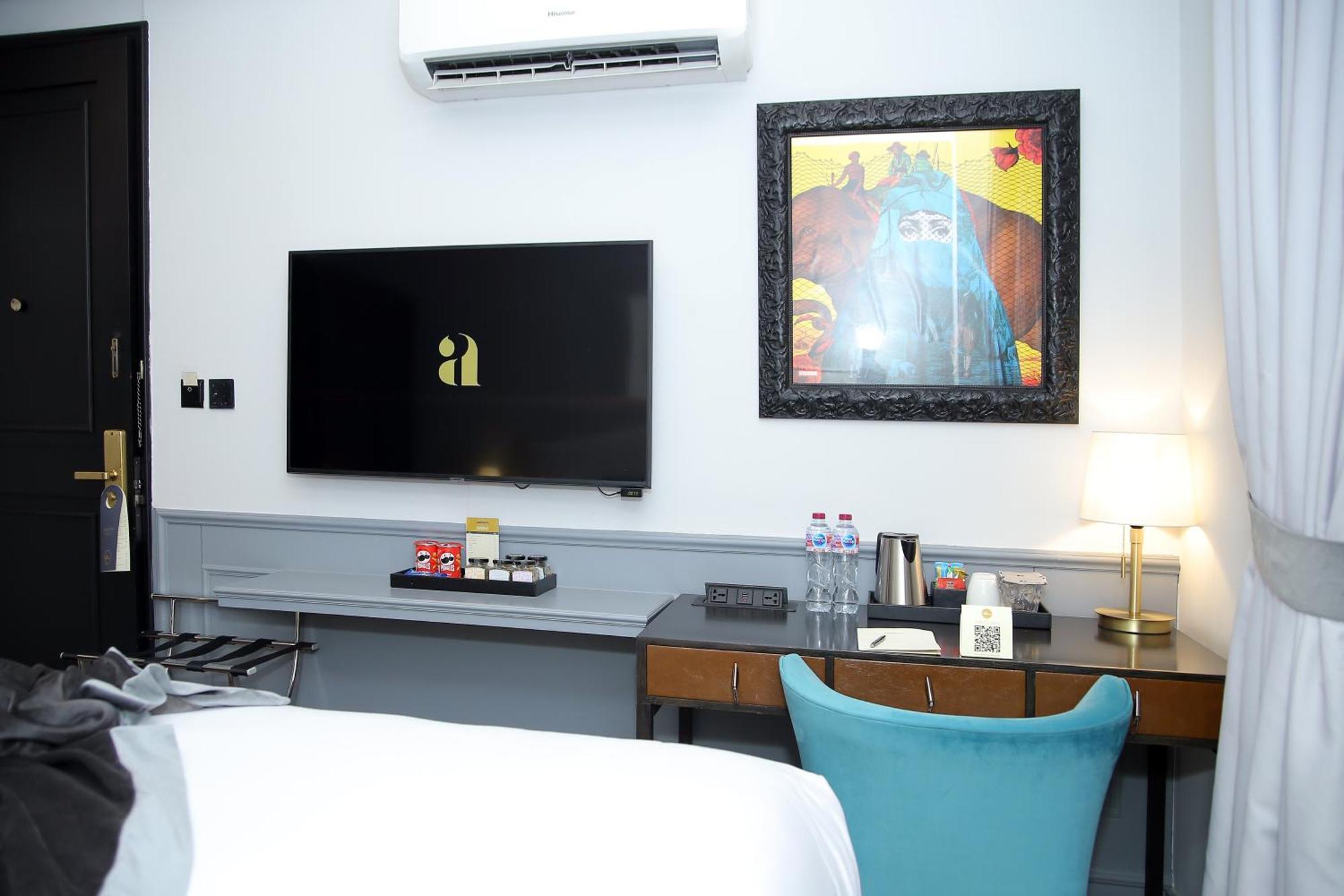 Ambiance Boutique Art Hotel Lahore Habitación foto A room at the hotel